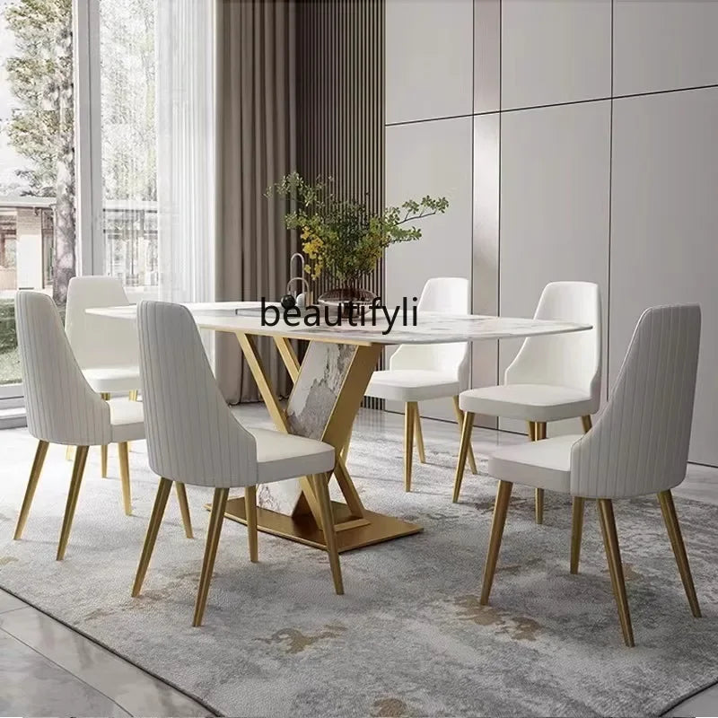 A Modern simple and high-end light luxury rock slab dining table, household small apartment marble table, rectangular
